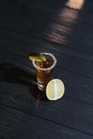 Tequila shot with lime . Selective focus photo