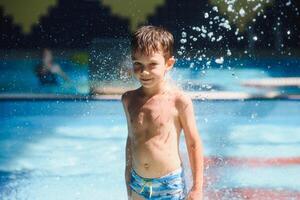 boy is in the water park. photo