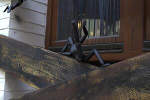 Little black manikins on a wooden boards. photo