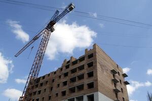 Construction of a multi storey residential building. Construction works photo