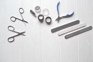 Tools for manicure. Manicure scissors on the white background. photo