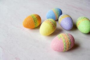 Easter eggs on a table. Beautiful easter background. Homemade holiday decor. photo