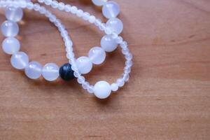 Necklace and bracelet from chalcedony and agate stone. The jewellery from minerals. photo