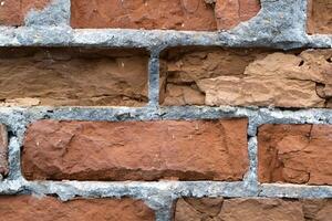 Red brick background. Textured brick wall. Old brick construction. photo