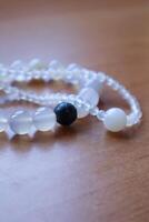 Necklace and bracelet from chalcedony and agate stone. The jewellery from minerals. photo