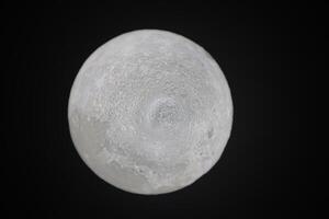 noche ligero lleno Luna. estatuilla de lleno Luna. Luna superficie. foto