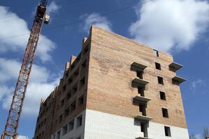 Construction of a multi storey residential building. Construction works photo