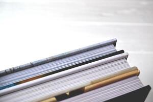 Books on the white desk. photo