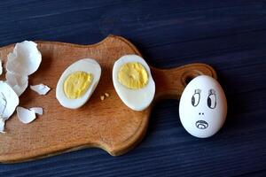 Easter still life. Creative easter background. Cooked eggs on a table in the kitchen. photo