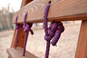 Knot on a colorful rope. Tools for climbing. photo