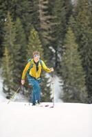 Ski mountaineer uphill with sealskins photo