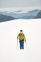 A man goes solo skiing photo