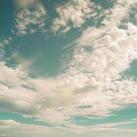 ai generado hermosa nubes aleteo en azul cielo foto