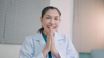 Doctor greets patient and talks hello Meeting at the hospital office to pick up medication. medical specialist .Health counseling video