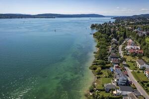 Aerial view from a drone of the beautiful coastline of Bodensee lake photo