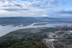 aerial view of an industrial zone near water photo