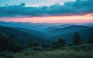 AI generated Sunset Over Misty Blue Mountains and Forest photo