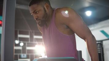 Black man workout in the gym. Healthy lifestyle concept video