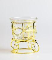 Empty table candle lamp on an elegant golden stand on a white background photo