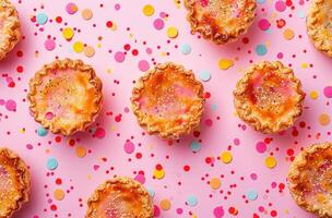 ai generado el vistoso y alegre Pastelería pasteles rodeando un rosado antecedentes foto