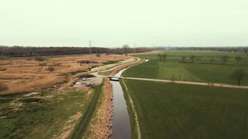 aerial view of a canal in the countryside video