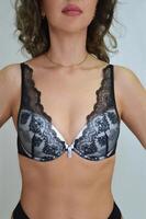 Lingerie. Beautiful lace black sexy bra on a model. Women's erotic lingerie. photo