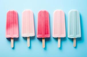 AI generated pastel sweet ice lollies are on a pink and blue background photo