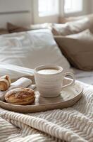 AI generated a tray with a cup of coffee and some pastries sits on a bed photo