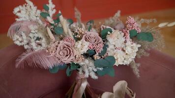 Beautiful modern wedding bouquet. Wedding bouquet of the bride. photo