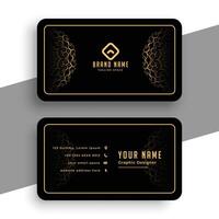 black business card in luxury golden mandala style vector