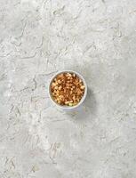 View from above of breadcrumb croutons in a white bowl on a tablescape photo