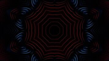 Black background with red and blue design in the center. Kaleidoscope VJ loop video