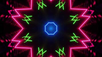 Colorful star pattern with black background and red center. Kaleidoscope VJ loop video