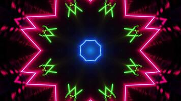 Colorful star pattern with black background and red center. Kaleidoscope VJ loop video