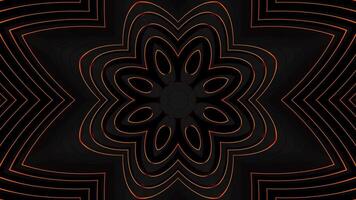 Black and orange flower with black background and black background. Kaleidoscope VJ loop video