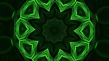 Green and black background with star pattern on it. Kaleidoscope VJ loop video