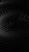 Black background with circular design in the center. Vertical looped animation video