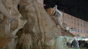 Four river fountain at night in Rome, Italy video