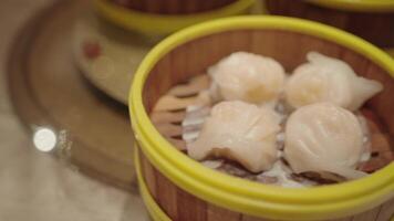 Variety of Steamed Chinese Dim Sum Food and Chopsticks video