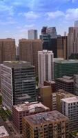Chicago panoramic view on sunny midday. Impressive buildings towering over complicated road systems. Aerial perspective. Vertical video