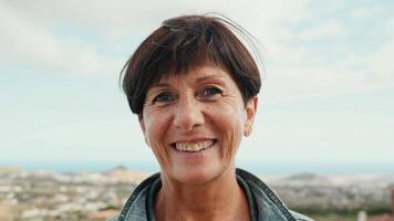 an african woman smiling in front of the camera video