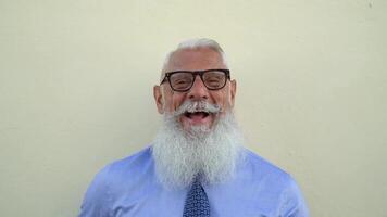 a happy man with a long white beard and glasses video