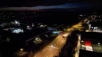 aereo Visualizza di illuminato centrale watford città di Inghilterra UK a notte. marzo 3°, 2024 video