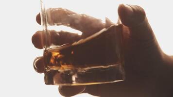 Close up of two people are cheering with cocktails in a bar or disco club. video