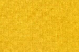 Yellow fabric cloth texture background, seamless pattern of natural textile. photo