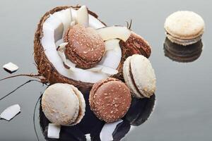 Coconut Macarons with Shredded Coconut on Grey Background, Food Blog Concept photo