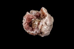 Macro mineral stone Pink Amethyst on a black background photo