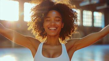 ai generado aptitud danza estudio clase. un alegre y energético mujer bailando en el gimnasio durante un rutina de ejercicio sesión foto