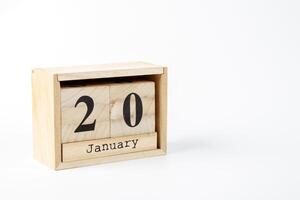 de madera calendario enero 20 en un blanco antecedentes foto