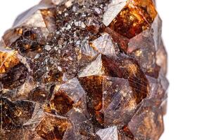 macro mineral garnet stone on a white background photo